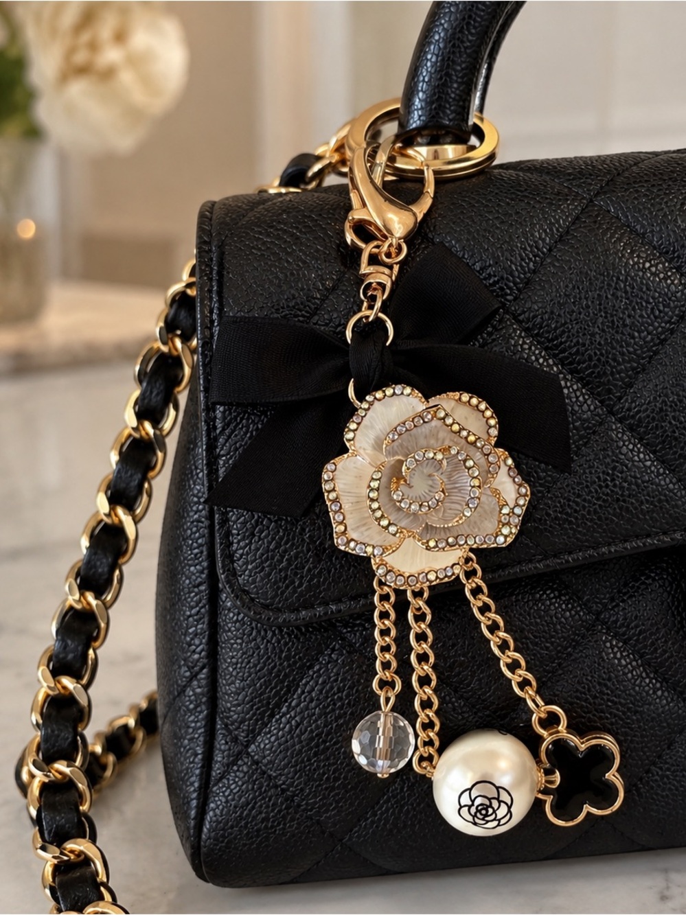 Luxury Inspired Gold-tone Black Bow & Floral Bag Charm